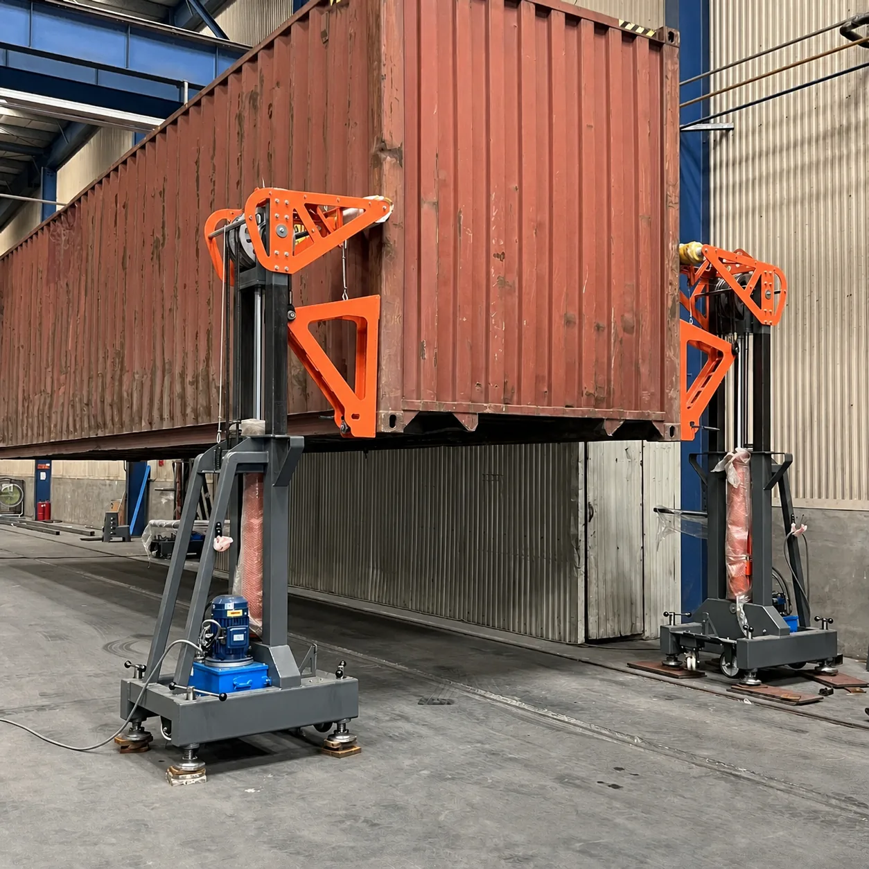 Container raised to create vehicle clearance